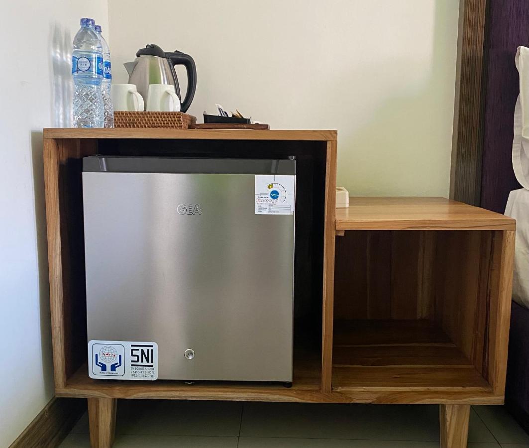 Отель Dikubu Belong Seminyak Экстерьер фото