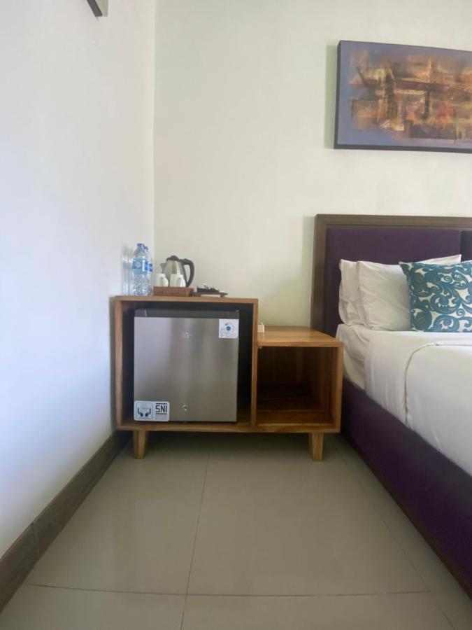 Отель Dikubu Belong Seminyak Экстерьер фото