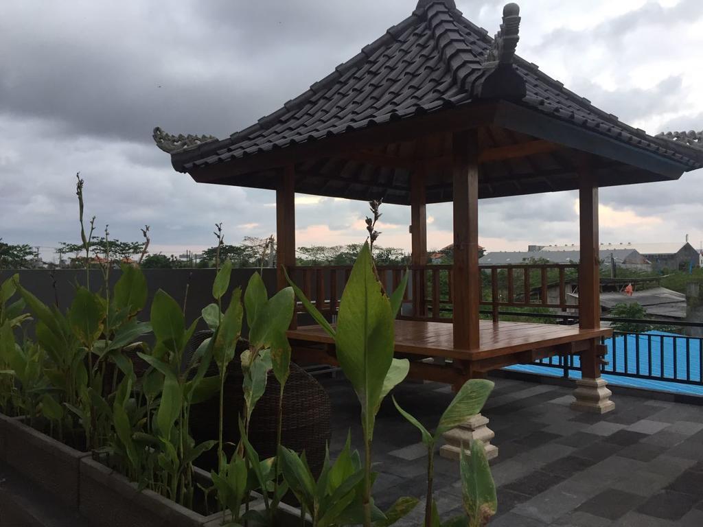 Отель Dikubu Belong Seminyak Экстерьер фото