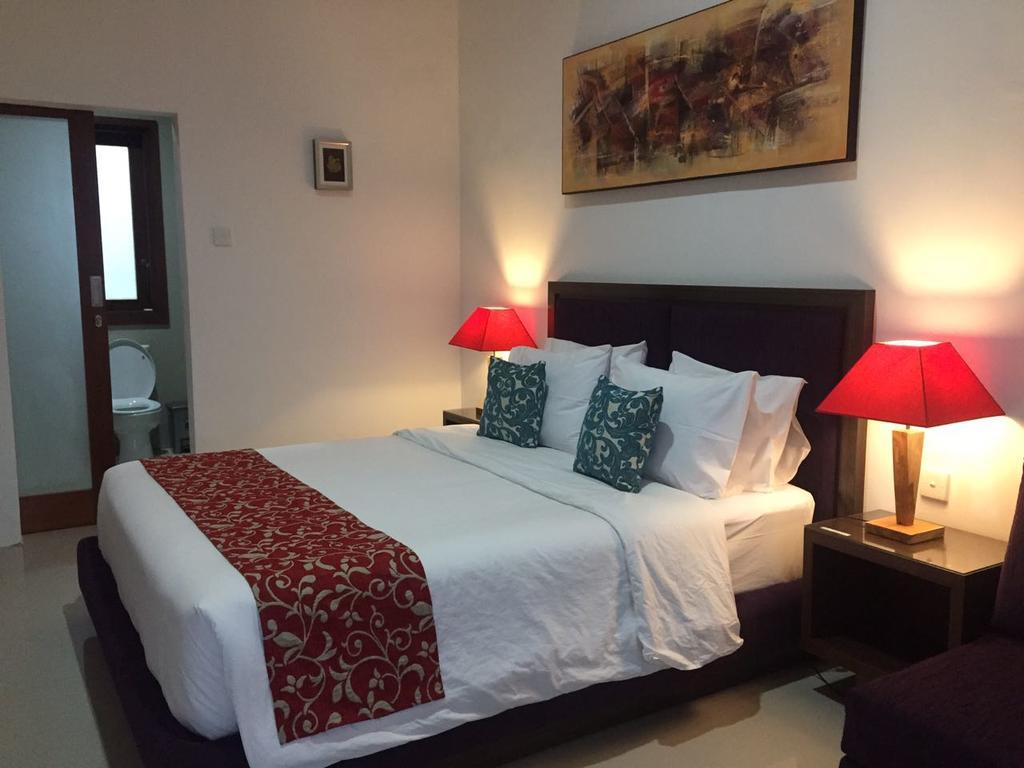 Отель Dikubu Belong Seminyak Экстерьер фото