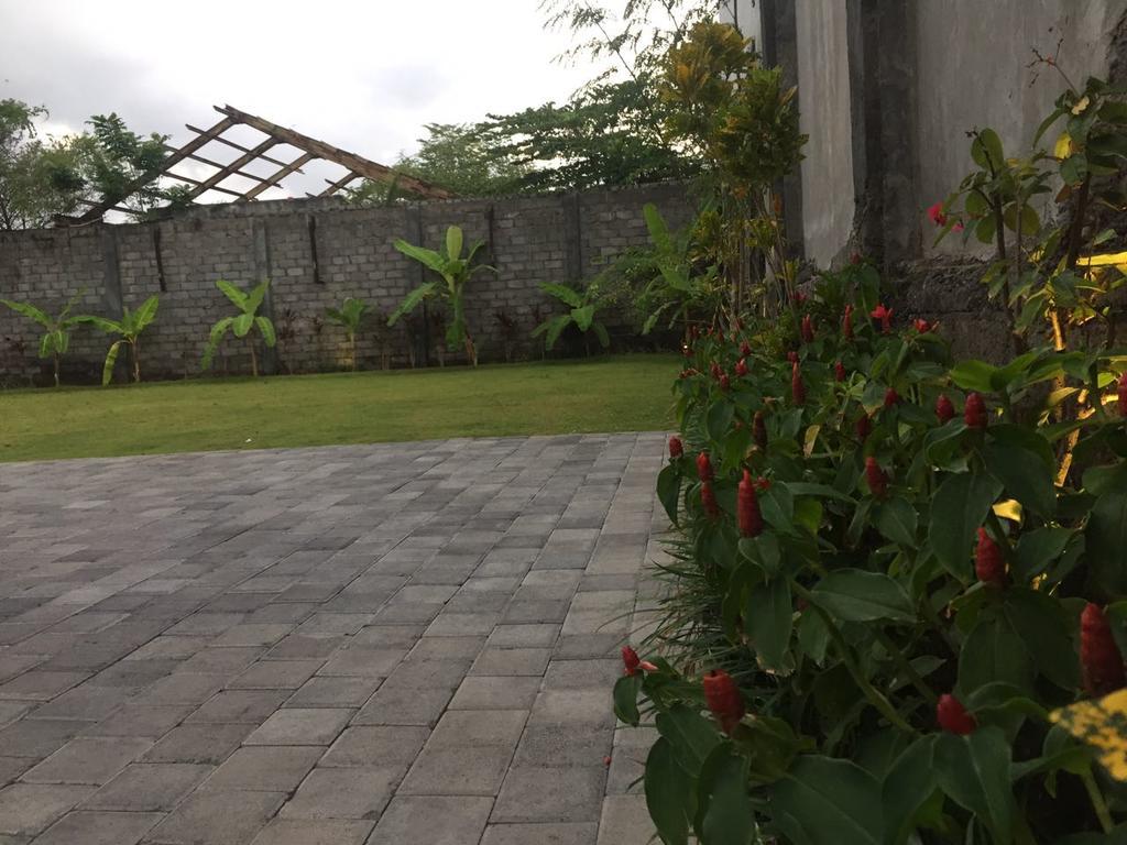 Отель Dikubu Belong Seminyak Экстерьер фото