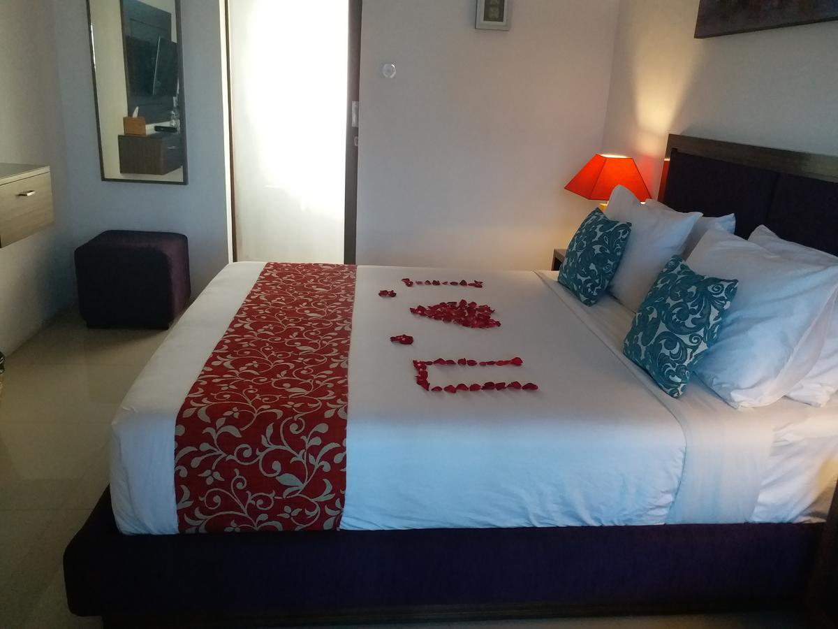 Отель Dikubu Belong Seminyak Экстерьер фото
